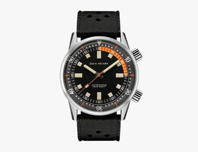 Powered by a Seiko NH35 automatic movement, the 1970s mimics the super compressor watches of decades past. - Gear Patrol -